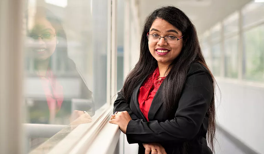 priyanka by a window