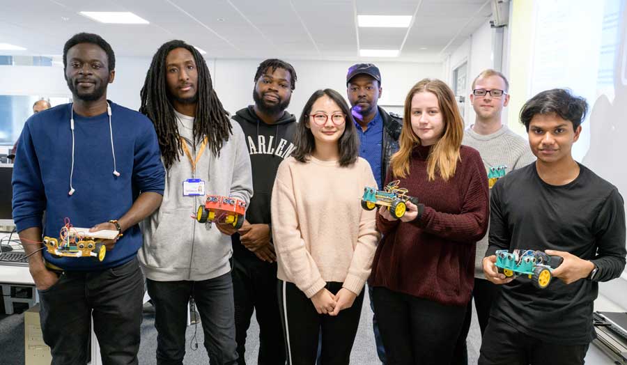 Research students with their robotic hardware