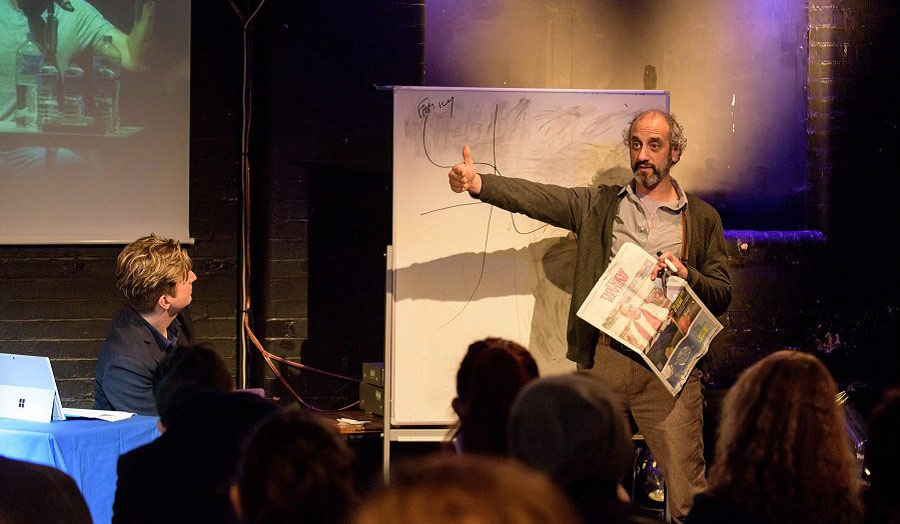 A lecturer giving a talk