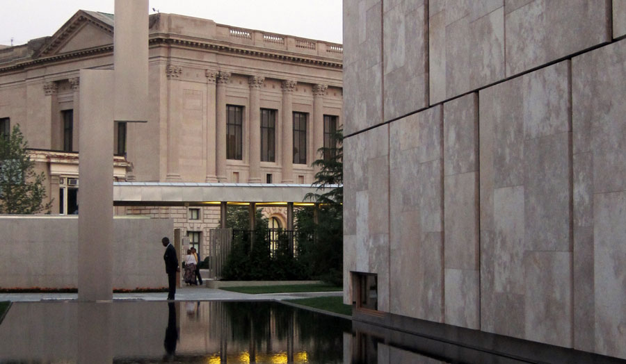 image of a contemporary library with water in foreground