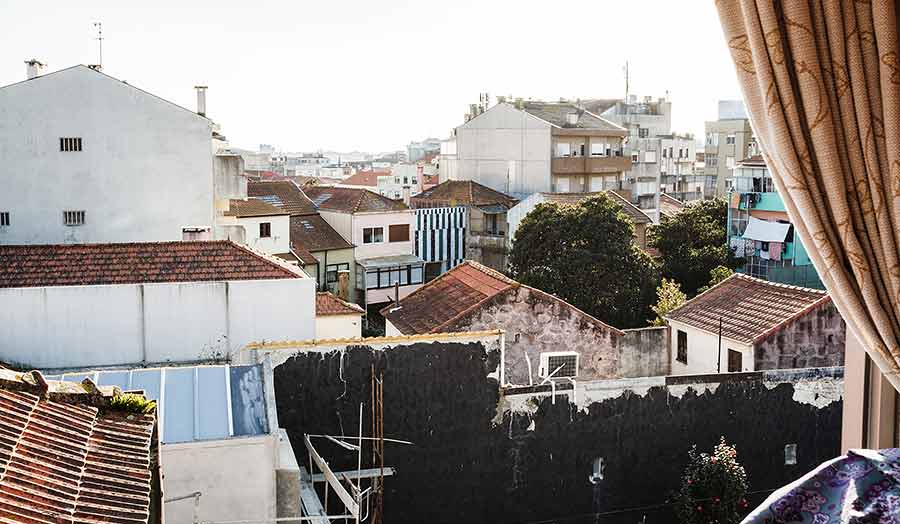 A high view of houses' roofs of a town