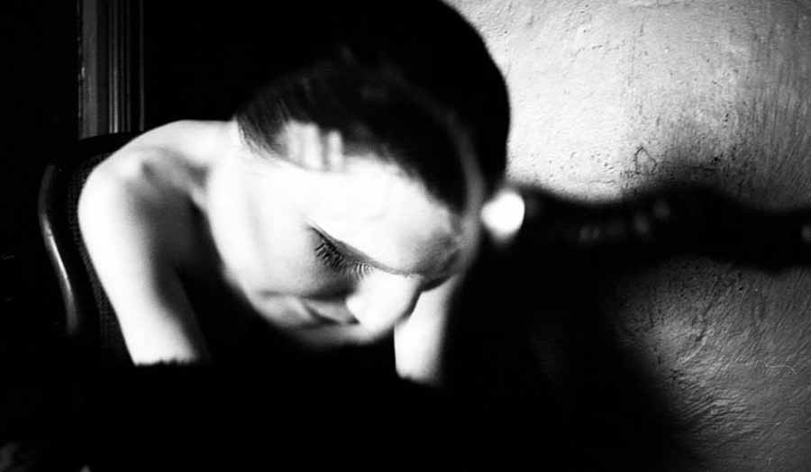 B&W close up of a woman's torso seen from above