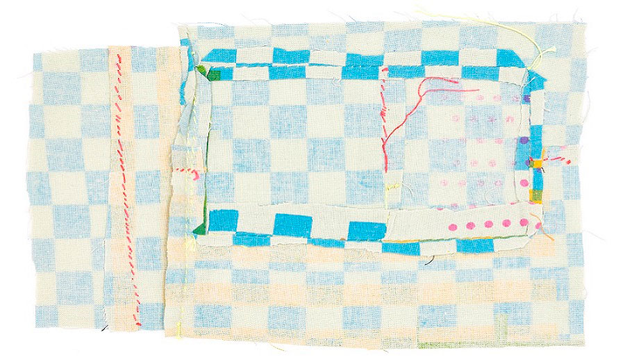 layers of blue and yellow checked fabric with red stitching