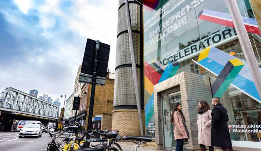 Students talking outside the Accelerator building in Kingsland Road 