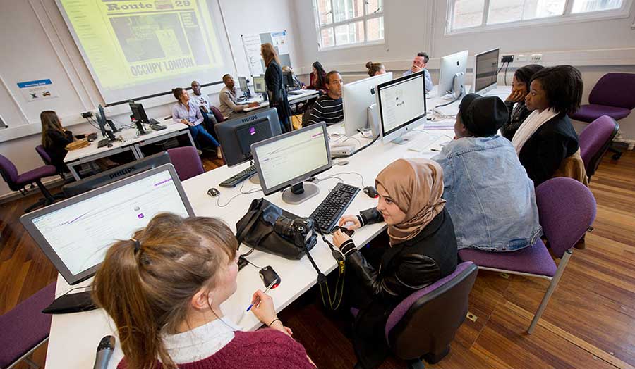Students in newsroom