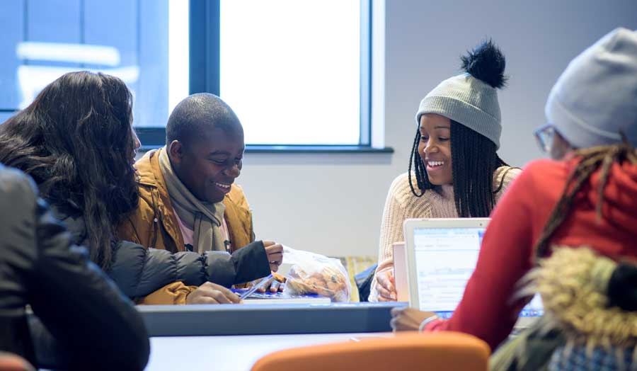 Students inside London Met's Roding building