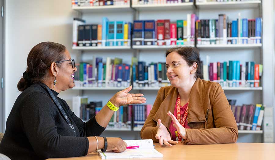 People talking in the library