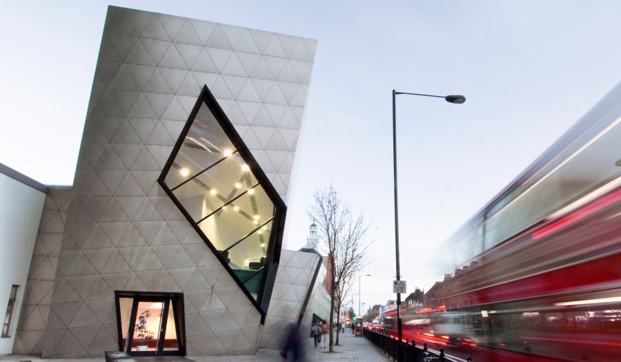 Shot of Graduate Centre with bus passing by with time delay effect 