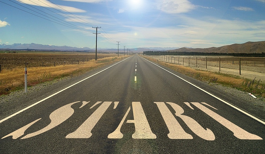 Road with the word 'start' in white paint