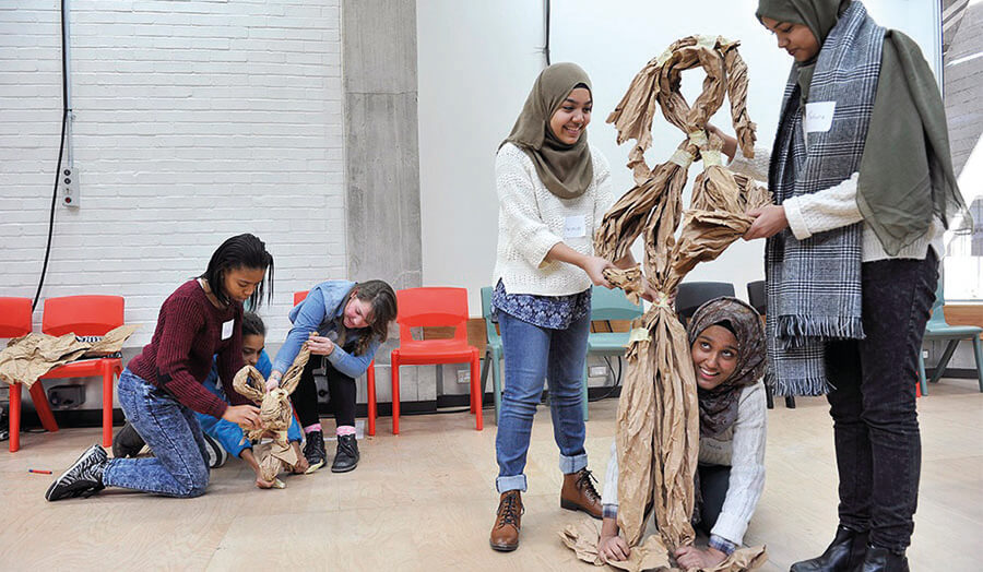 Students making puppets