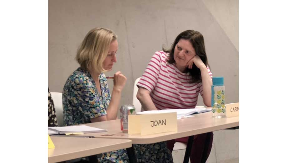 Two female students in discussion