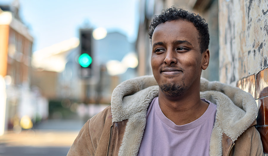 Diini Muse smiling with traffic light in background
