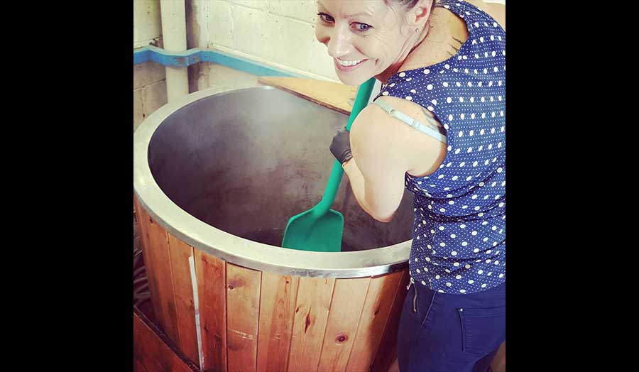 Lou mixing up a batch of kombucha