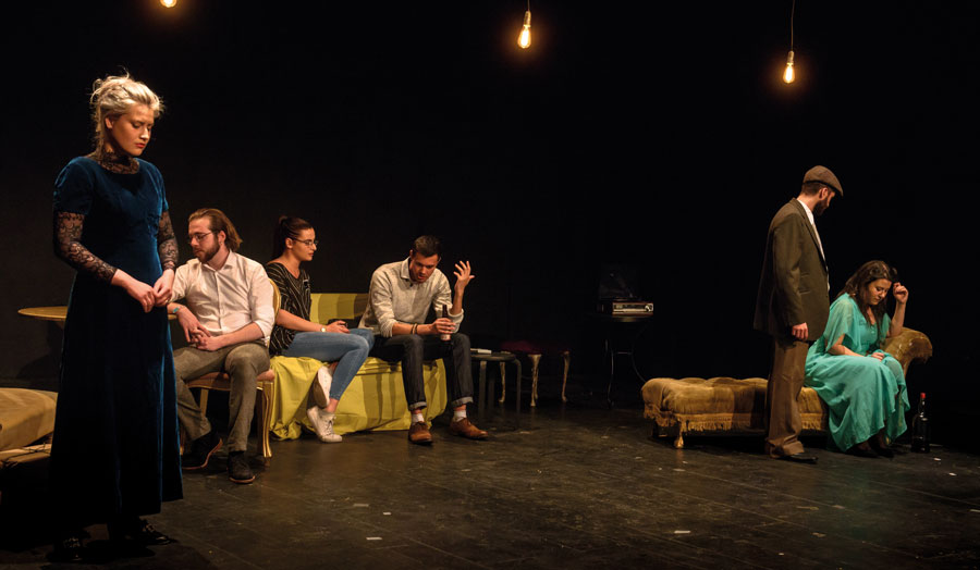 Students standing on stage